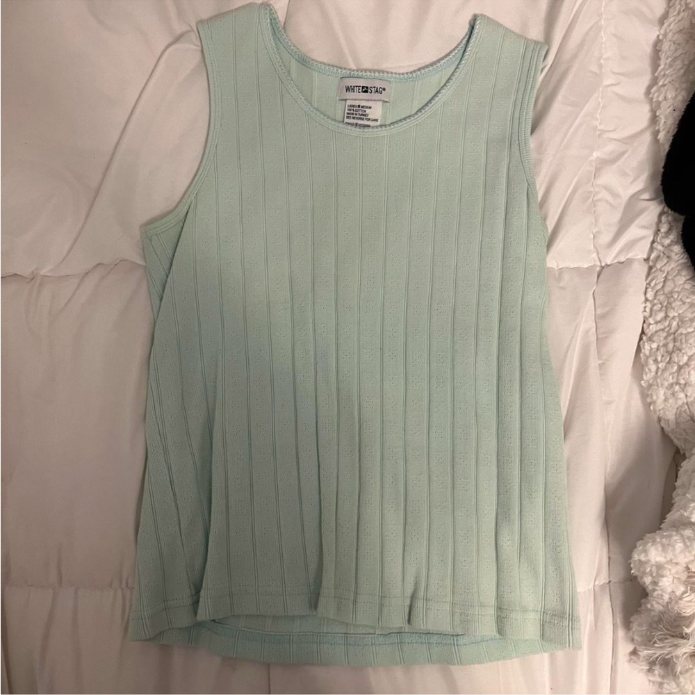 Light green tank top. White stag; size Medium